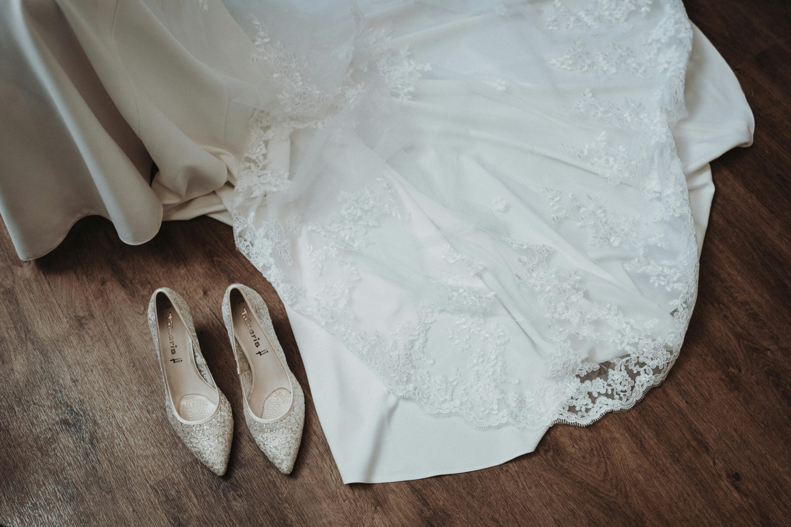 Perfect gown being tailored on mannequin with precision adjustments